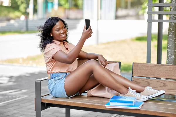 African student girl taking selfie with smartphone — Stock Photo, Image