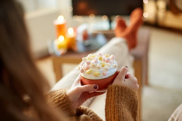 Woman with cream and marshmallow on halloween — Stock Photo, Image