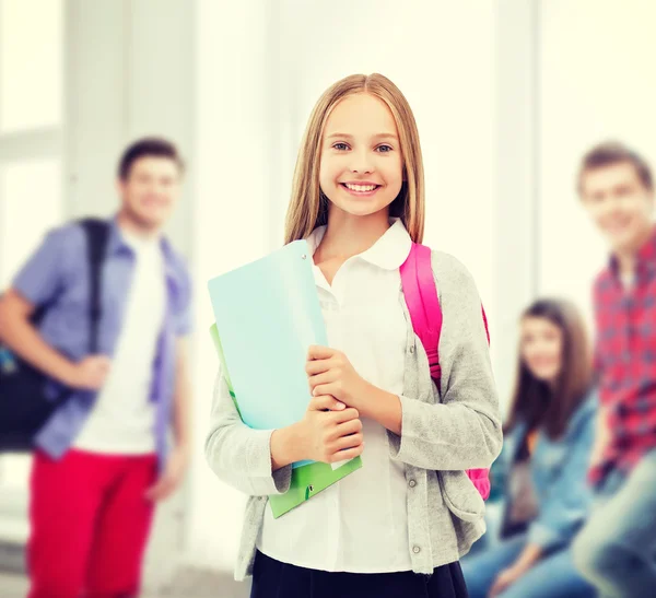 Happy and smiling teenage girl Stock Photo