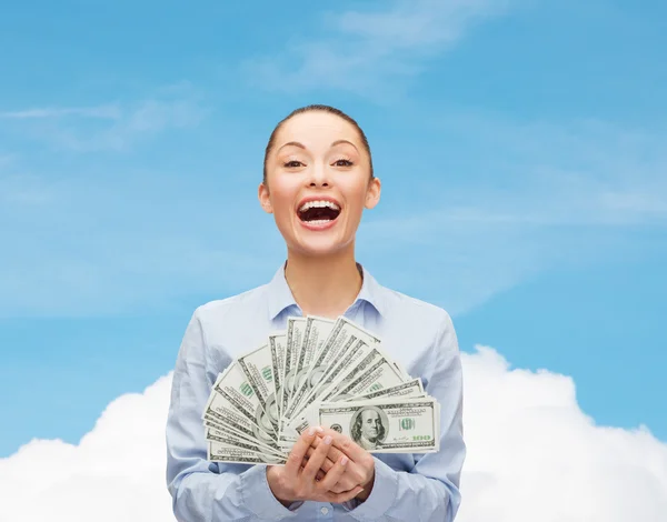 Laughing businesswoman with dollar cash money — Stock Photo, Image