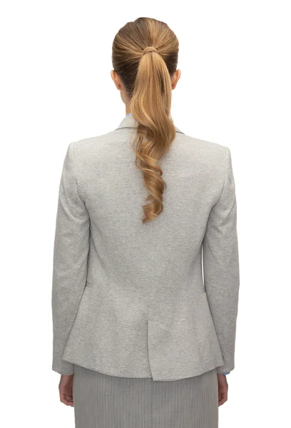 Affärskvinna eller lärare i kostym från baksidan — Stockfoto