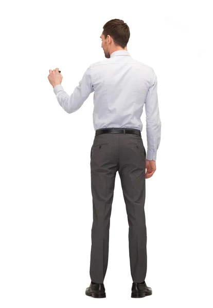 Businessman or teacher with marker from back — Stock Photo, Image