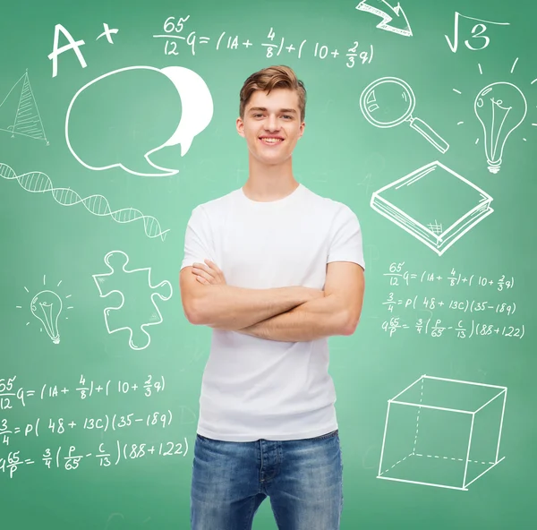 Smiling young man in blank white t-shirt — Stock Photo, Image