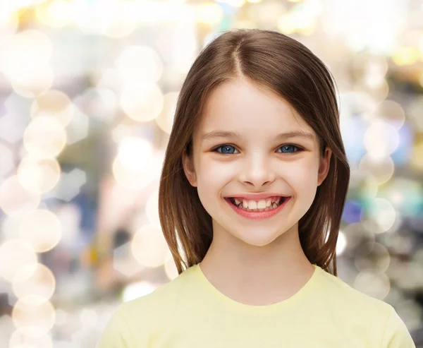 Sorridente bambina su sfondo bianco — Foto Stock