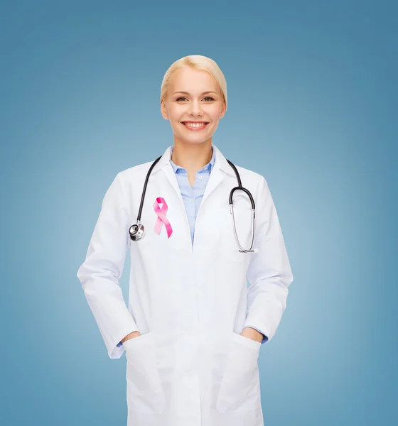 Doctor with stethoscope, cancer awareness ribbon — Stock Photo, Image