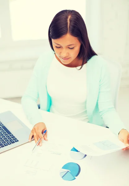 Businesswoman or student with laptop and documents — Stock Photo, Image
