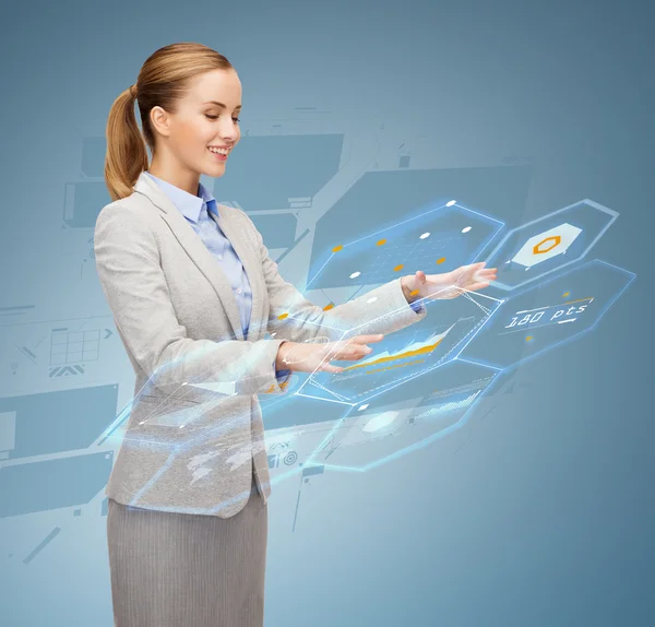 Smiling businesswoman working with virtual screen — Stock Photo, Image