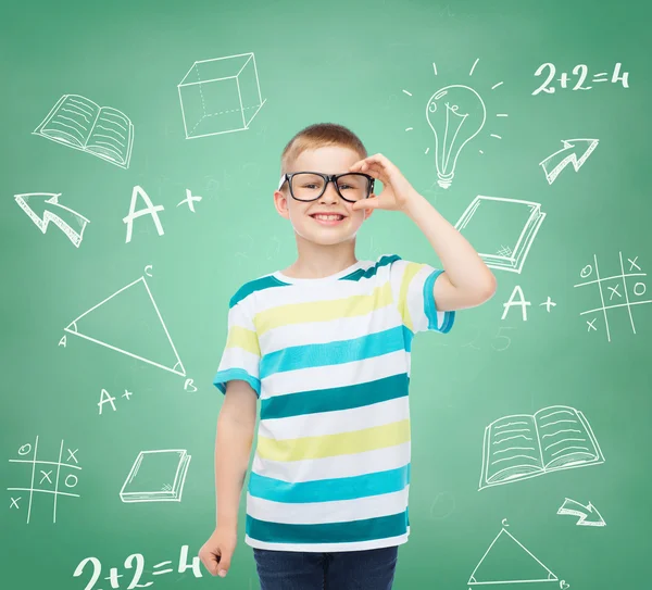 Smiling little boy in eyeglasses Royalty Free Stock Images