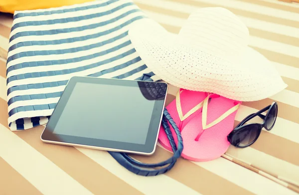 Close up of tablet pc on beach — Stock Photo, Image