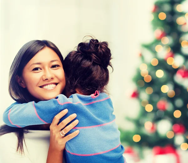 Hugging mother and daughter — Stock Photo, Image