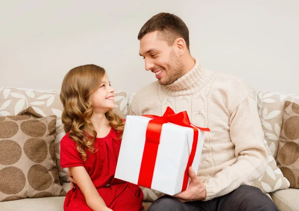 Smiling father and daughter looking at each other — Stock Photo, Image