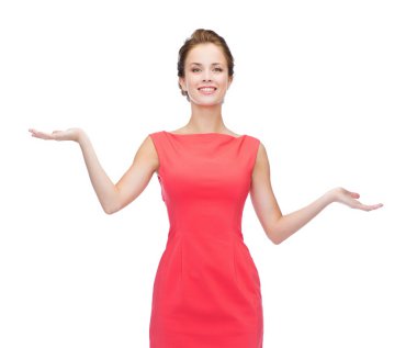smiling woman holding something imaginary on palms clipart
