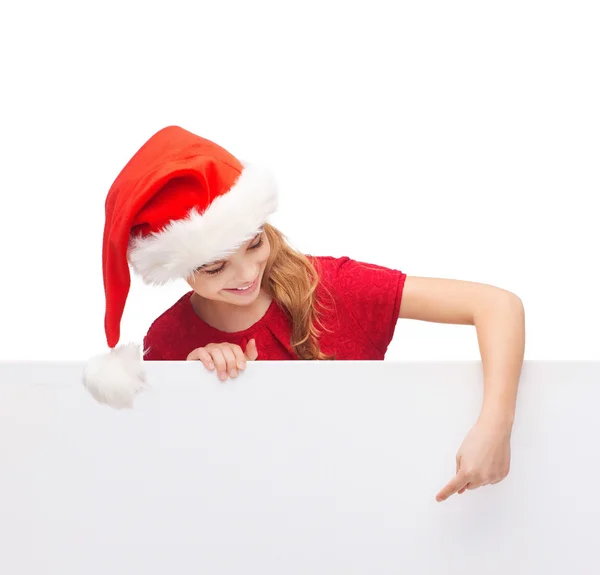 Boş beyaz tahta ile santa yardımcı şapkalı çocuk — Stok fotoğraf