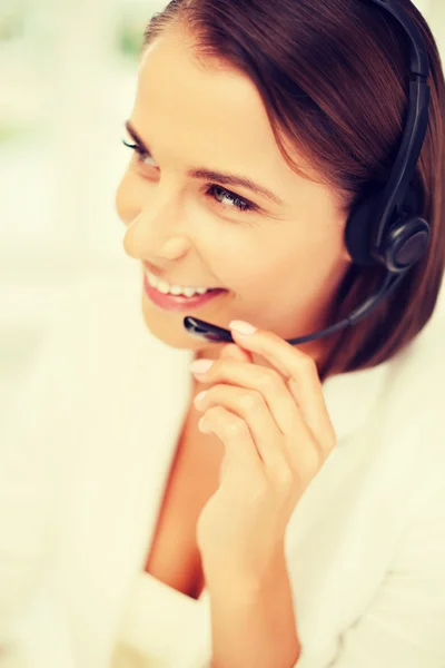 Vrouwelijke hulplijn operator met hoofdtelefoon — Stockfoto