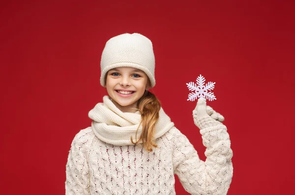 Girl with big snowflake — Stock Photo, Image