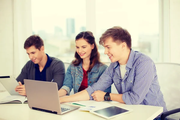 Students with laptop, notebooks and tablet pc — Stock Photo, Image