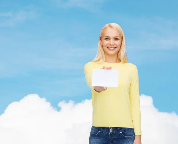 Smiling girl with blank business or name card — Stock Photo, Image