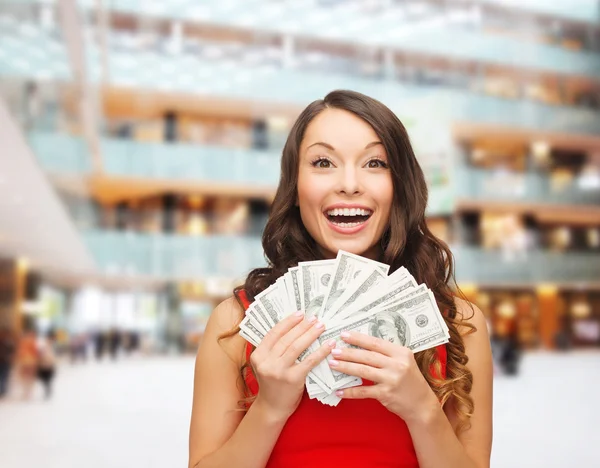 Woman in red dress with us dollar money — Stock Photo, Image