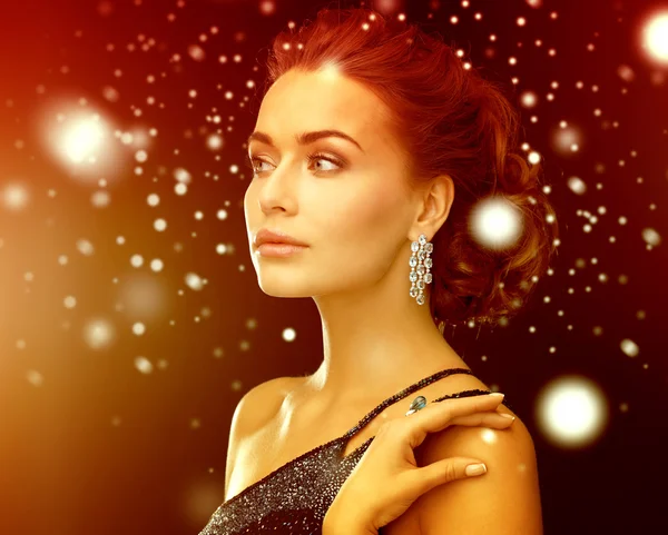 Woman with diamond earrings Stock Photo