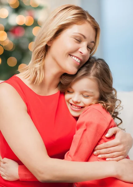 Hugging mother and daughter — Stock Photo, Image