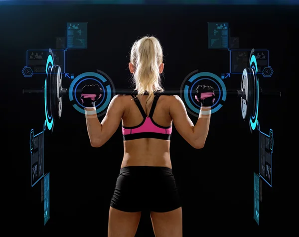 Sporty woman exercising with barbell from back — Stock Photo, Image