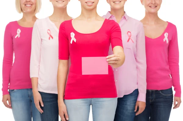 Close up of women with cancer awareness ribbons — Stock Photo, Image