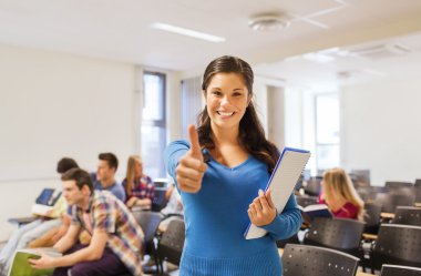 group of smiling students in lecture hall clipart