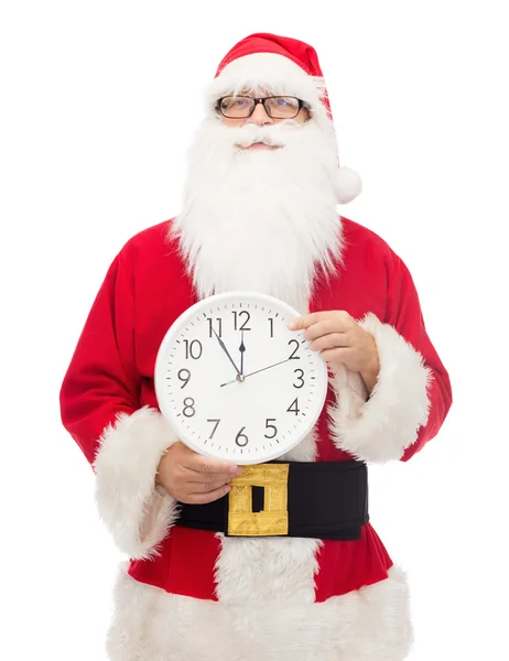 Uomo in costume di Babbo Natale con orologio — Foto Stock
