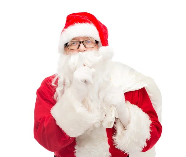 Homme en costume de Père Noël claus avec sac — Photo