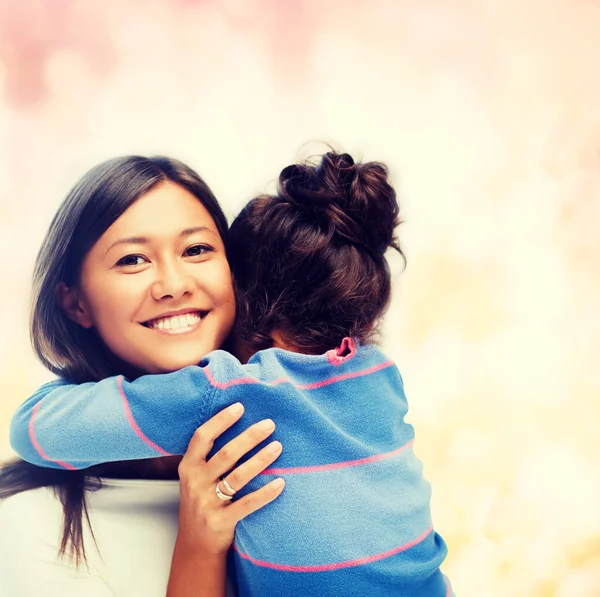 Hugging mother and daughter — Stock Photo, Image