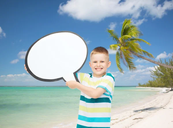 Smiling little boy with blank text bubble — Stock Photo, Image