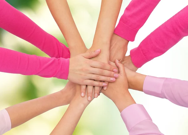 Close up of women with hands on top — Stock Photo, Image