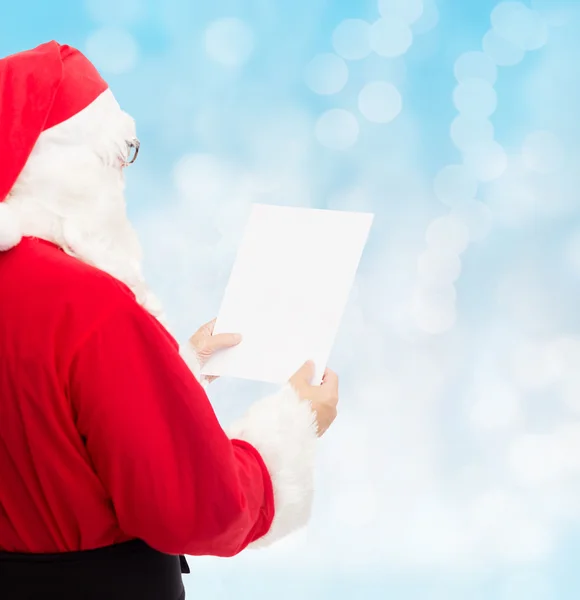 Man in costume of santa claus with letter — Stock Photo, Image
