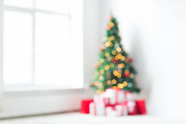 Room with christmas tree and presents background — Stock Photo, Image