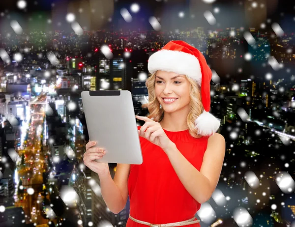 Woman in santa helper hat with tablet pc — Stock Photo, Image
