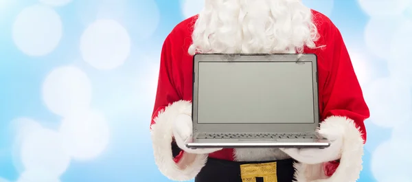 Close up of santa claus with laptop — Stock Photo, Image