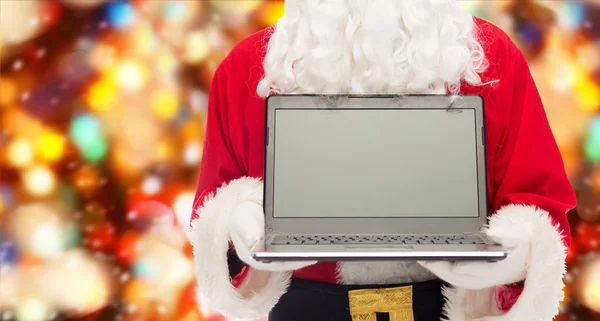 Close up of santa claus with laptop — Stock Photo, Image