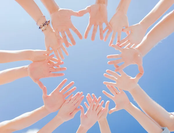 Close up of circle of hands — Stock Photo, Image