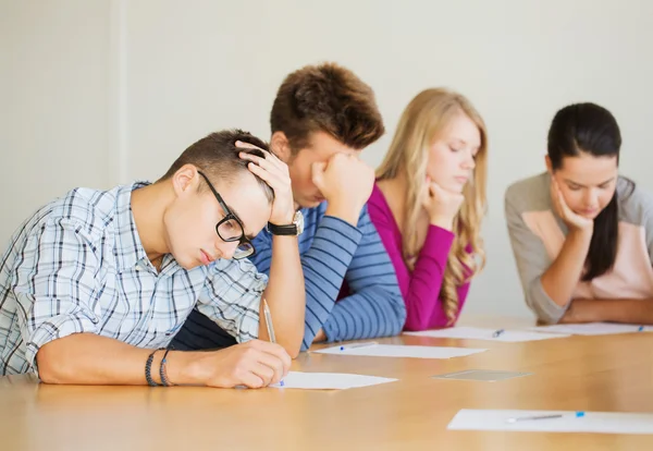 Group of students with papers — Stock Photo, Image