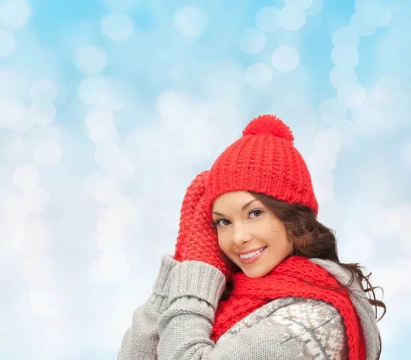 Smiling young woman in winter clothes Stock Image