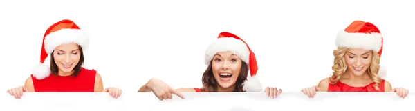 Women in santa helper hat with blank white board — Stock Photo, Image