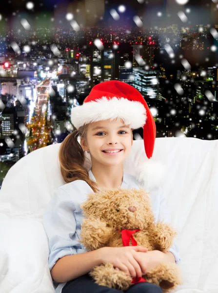 Smiling little girl with teddy bear — Stock Photo, Image