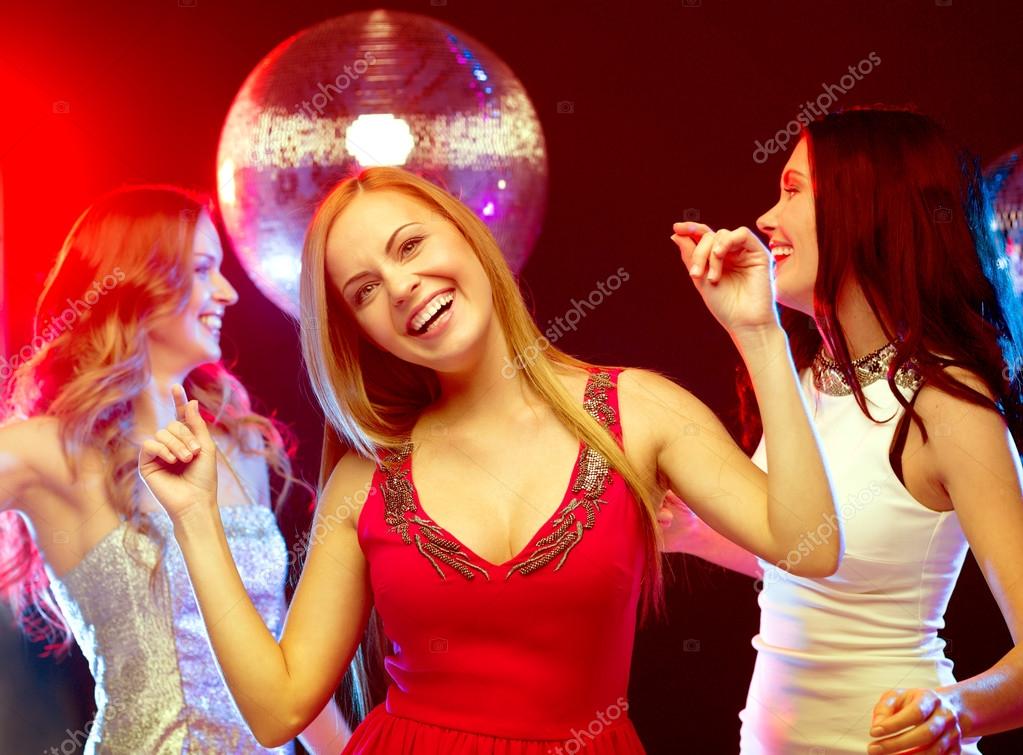 Three smiling women dancing in the club Stock Photo by ©Syda ...
