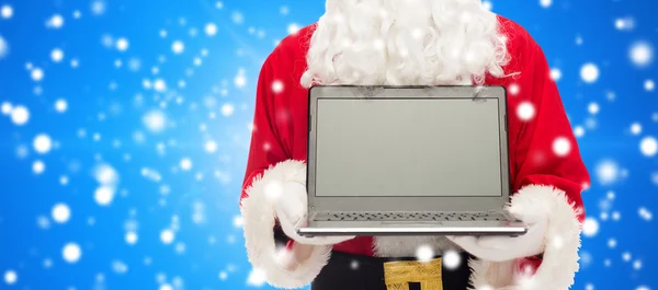 Close up of santa claus with laptop — Stock Photo, Image