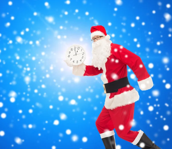 남자 시계와 산타 클로스의 의상 로열티 프리 스톡 이미지