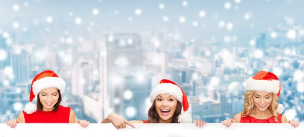 Women in santa helper hat with blank white board — Stock Photo, Image