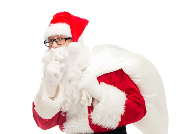 Mann im Weihnachtsmannkostüm mit Tasche — Stockfoto