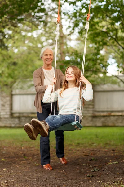 Happy family in front of house outdoors — Stock Photo, Image