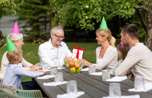 Happy family having holiday dinner outdoors — Stock Photo, Image