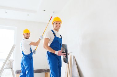 group of builders with tools indoors clipart